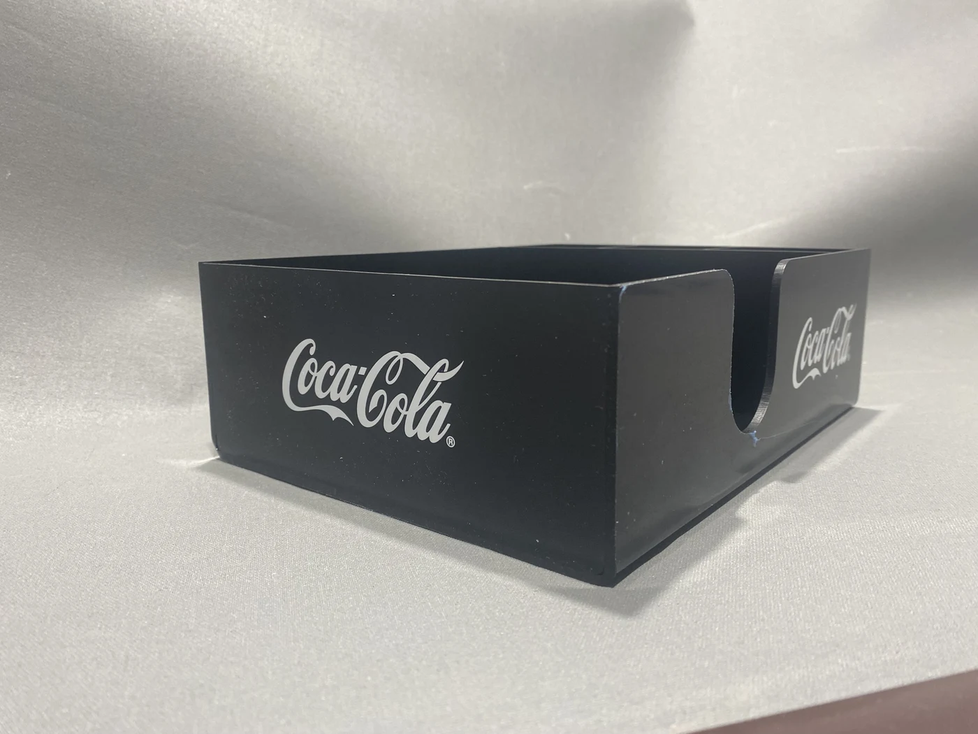 Coca-Cola — restaurant napkin stand, black satin acrylic with white logo