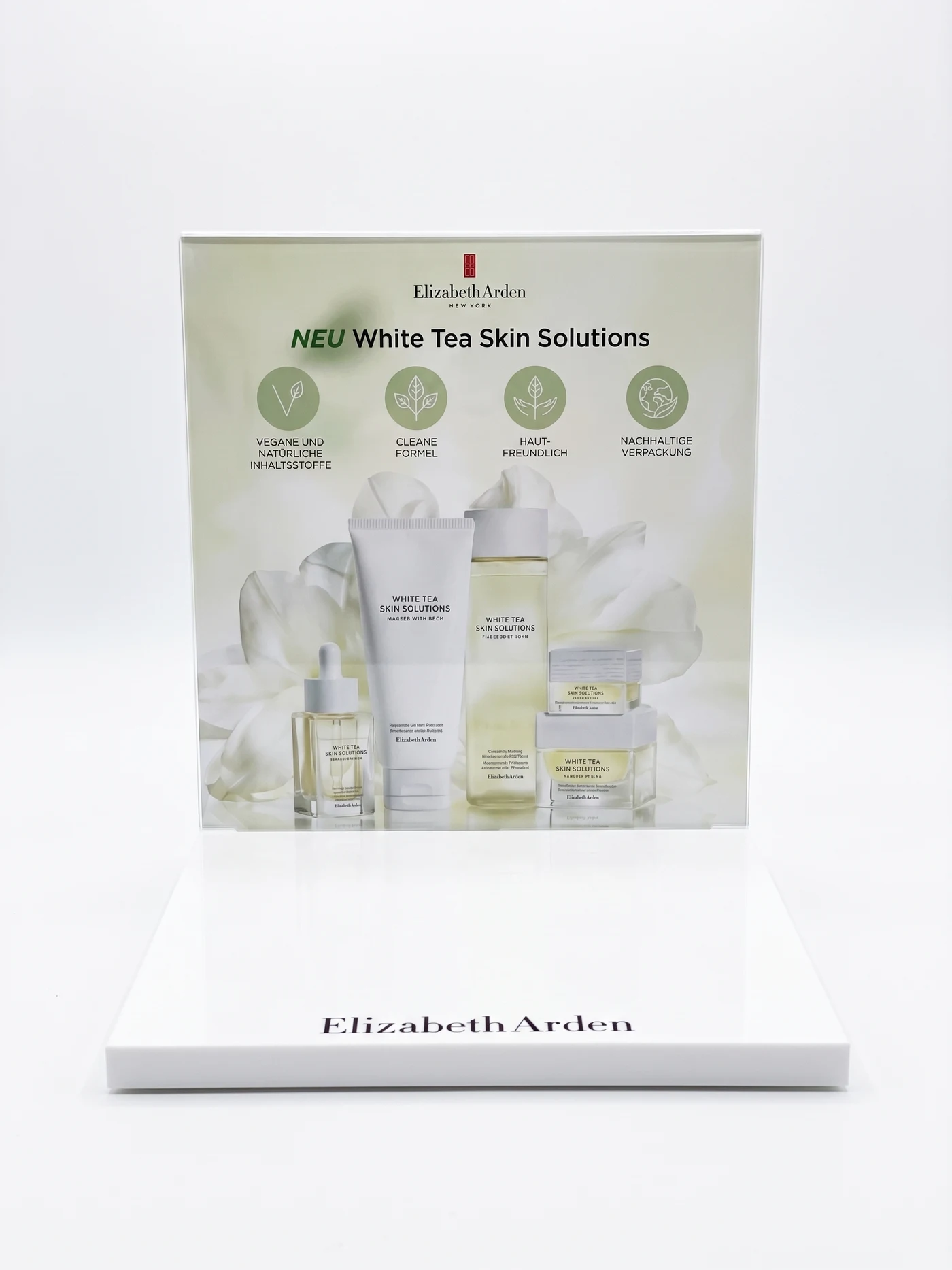 Elizabeth Arden — White Tea cosmetics display Skin Solutions for market German, white plexi with graphics UV