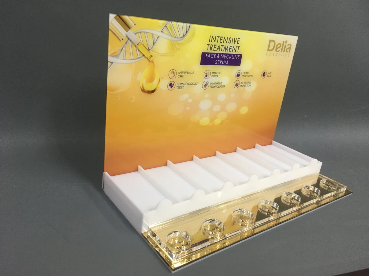 Cosmetic display tray from clear acrylic and HIPS — channels for serum