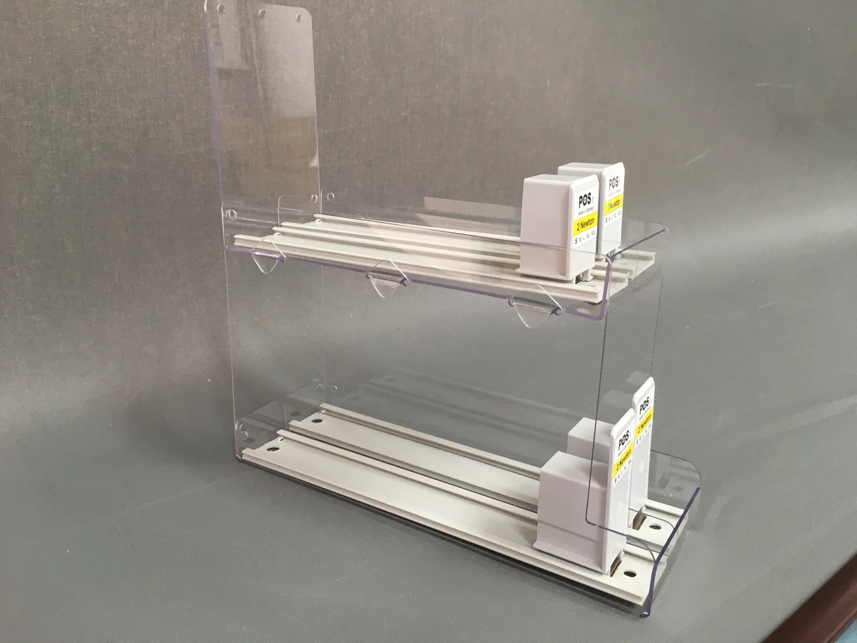 Pusher dwupoziomowy POS from clear acrylic — rails aluminium and springs