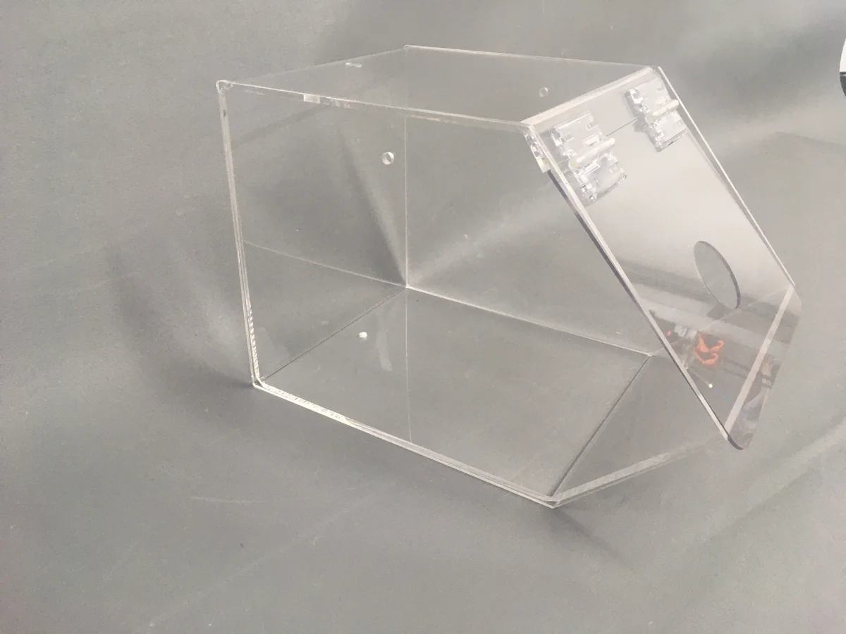 Container with a tilting lid on hinges — 4 mm clear acrylic