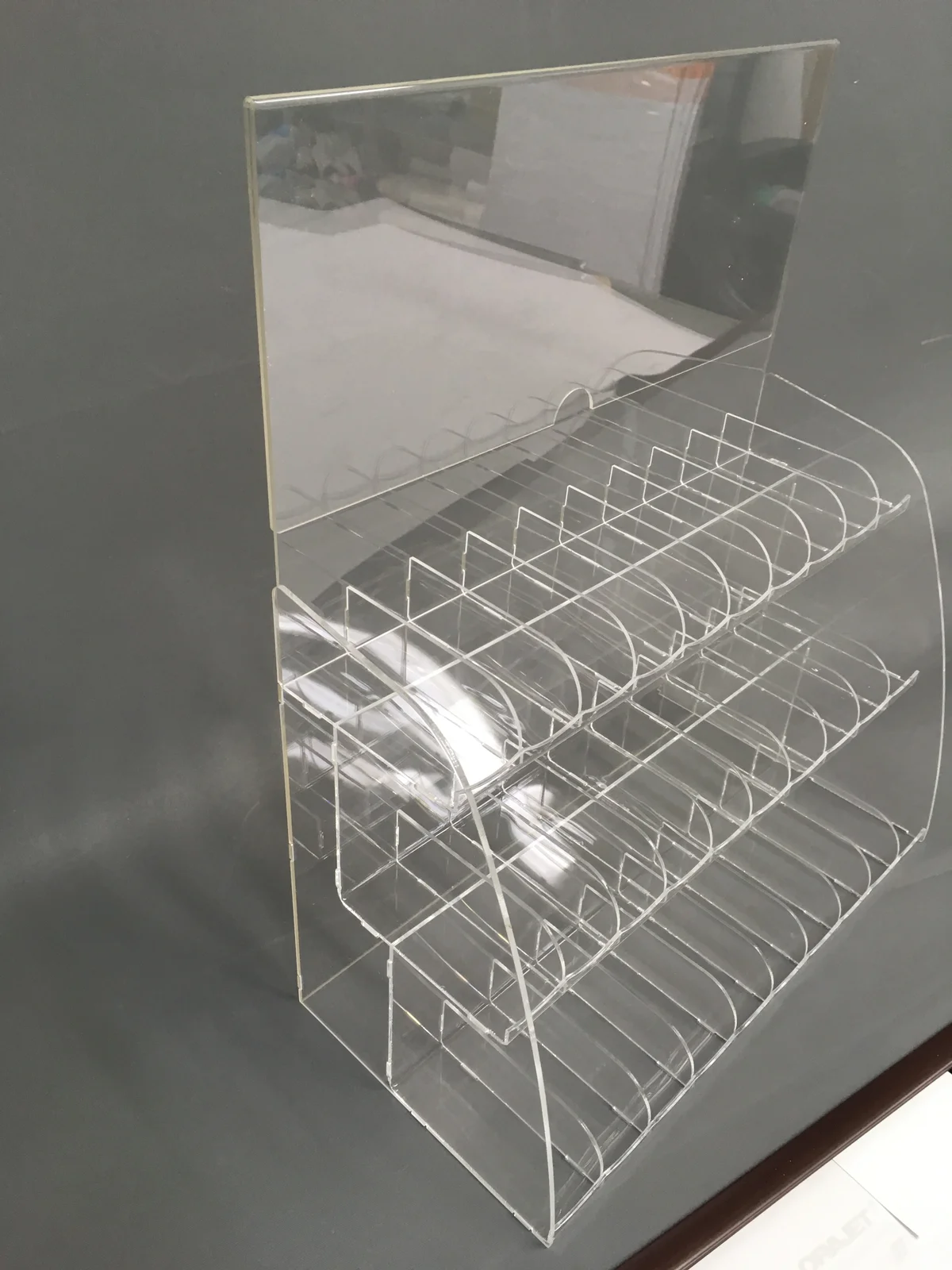 Stand for pomadki from clear acrylic — steps with openings for cosmetics