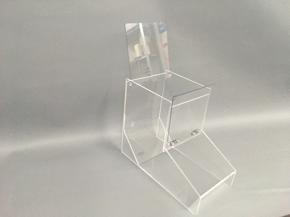 Container from open lid and extended rear wall — clear acrylic