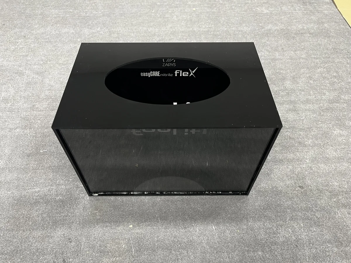 Black electronics enclosure from glossy black acrylic with a flex logo