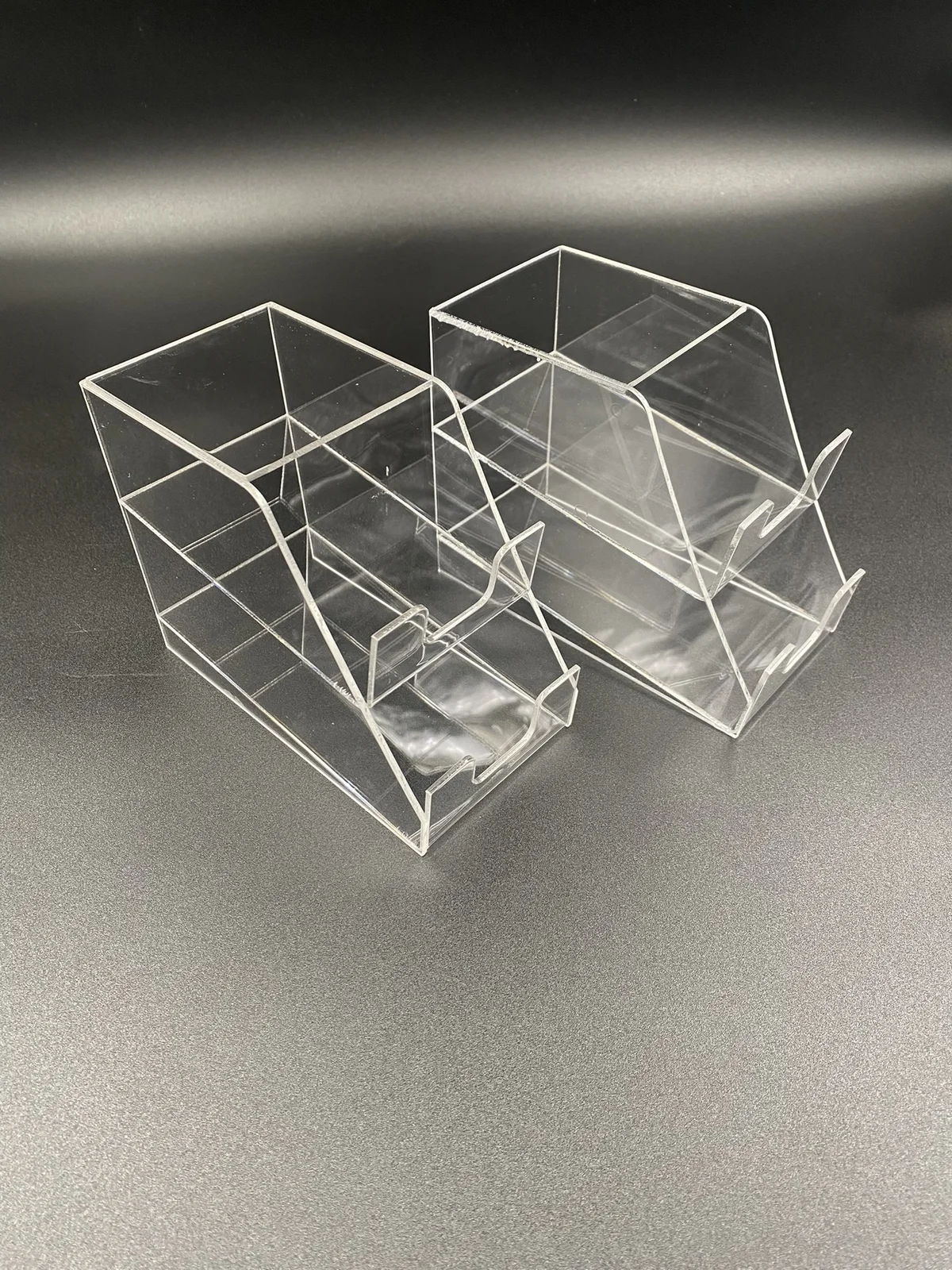 Pair of small box displays from clear acrylic from compartments
