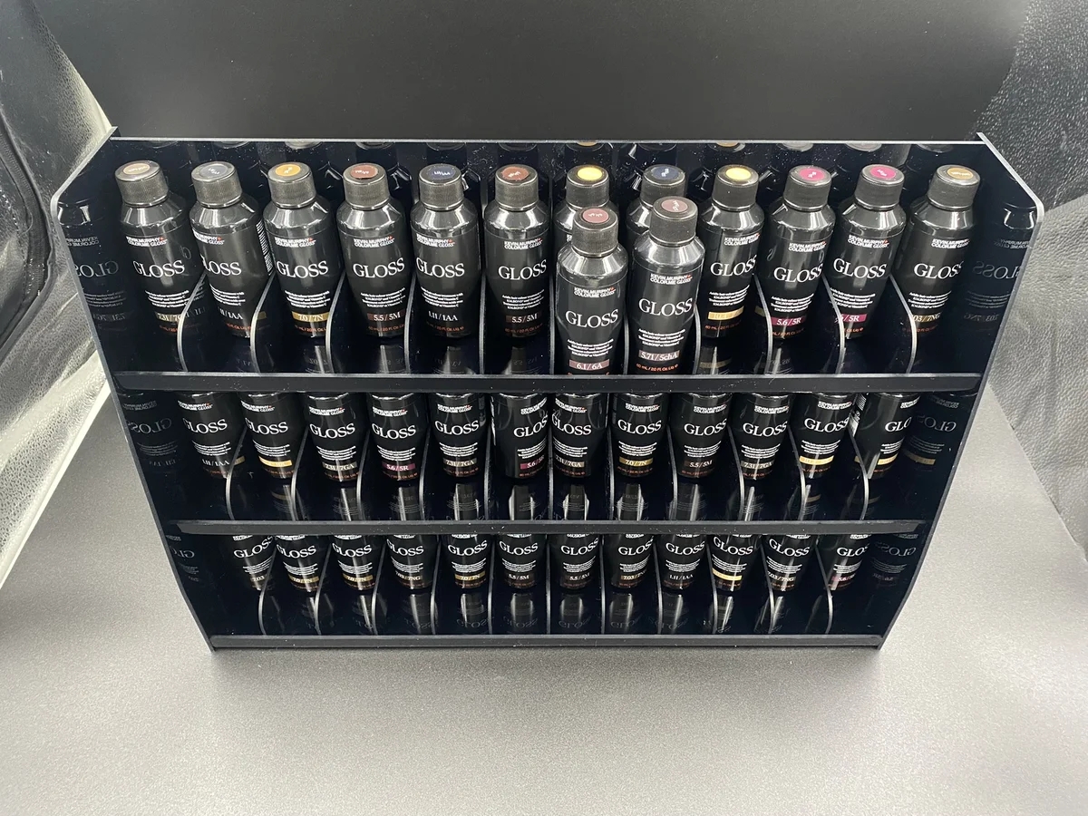 Stand display in three rows full of cosmetics butelkowych — black acrylic