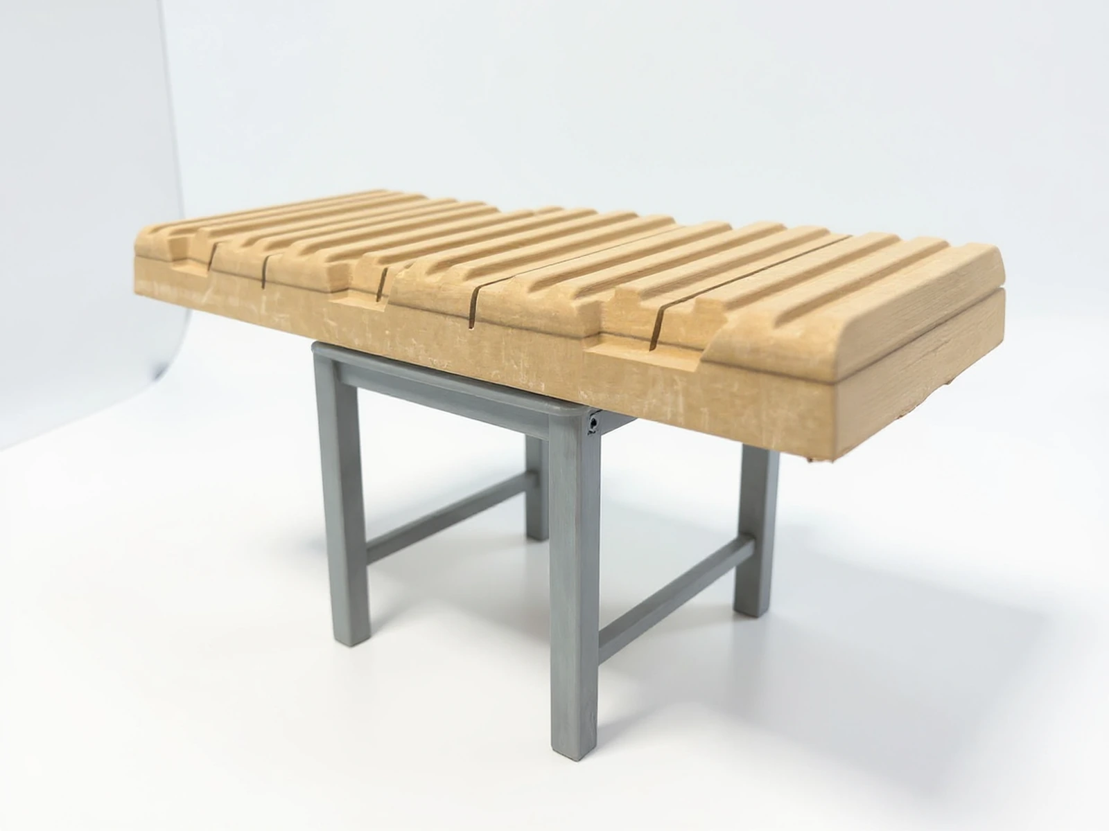 Project PlexiSystem — Display for presenting products from beige fabric, metal frame and compartments for displaying items
