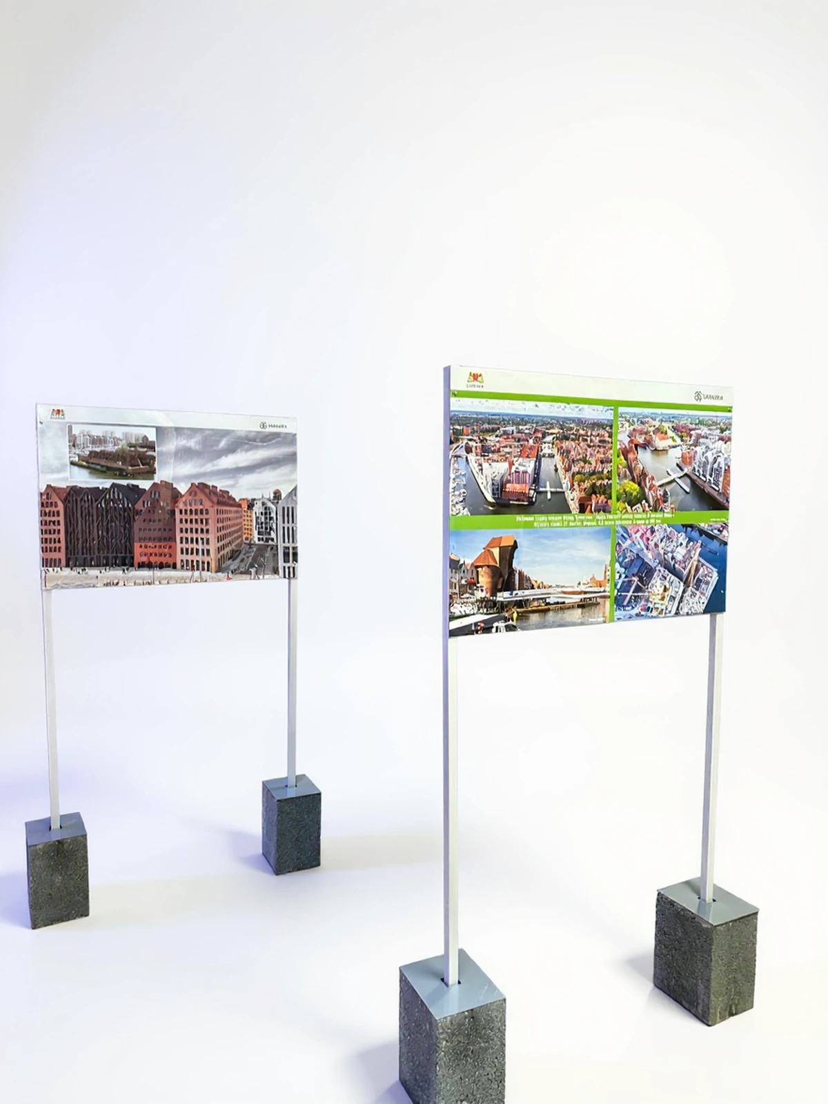 PlexiSystem — Ekspozytory stojące z plexi na postumentach betonowych, wykorzystywane do wystawy informacyjnych plakatów i materiałów p