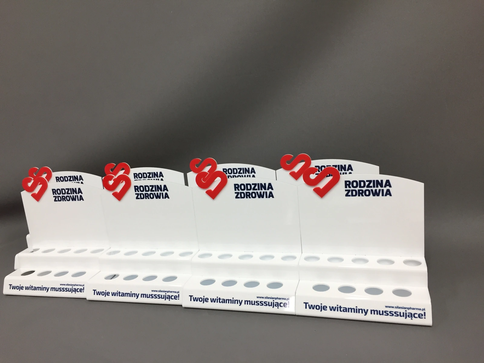 Rodzina Zdrowia — Display shelf from acrylic for presenting products pharmaceutical/vitamins from red hearts and possess for tablets