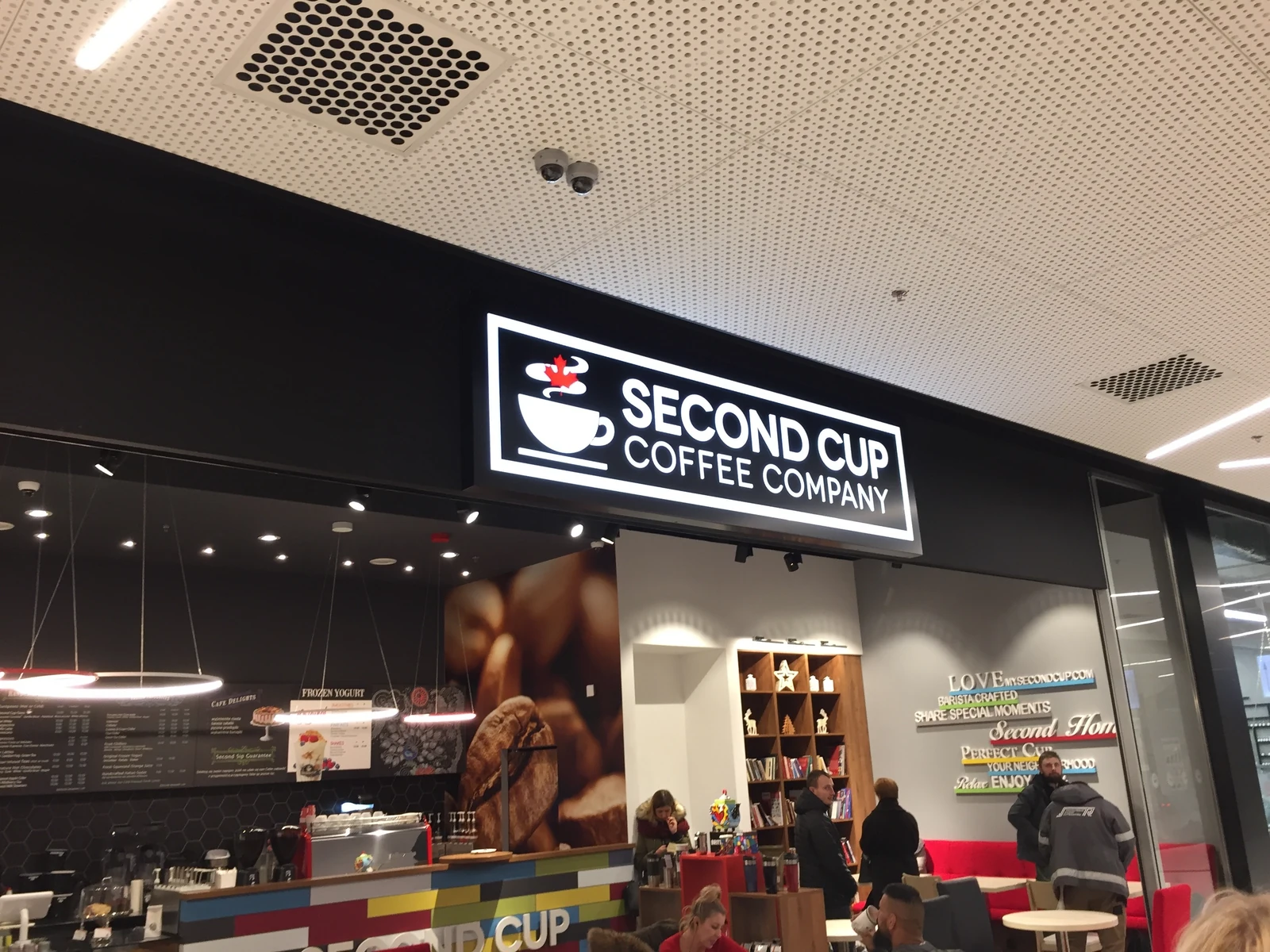 Second Cup Coffee Company — Lightbox light with logotypem and name kawiarni, made from acrylic from LED backlight, placed nad entrance for lokalu