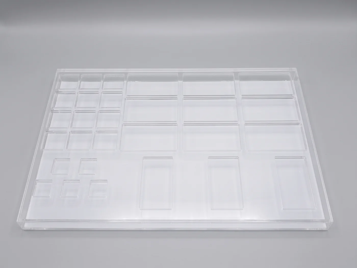 Drugstore chain premium — organizer cosmetic from clear acrylic, CNC-milled, wieloprzegrodowy