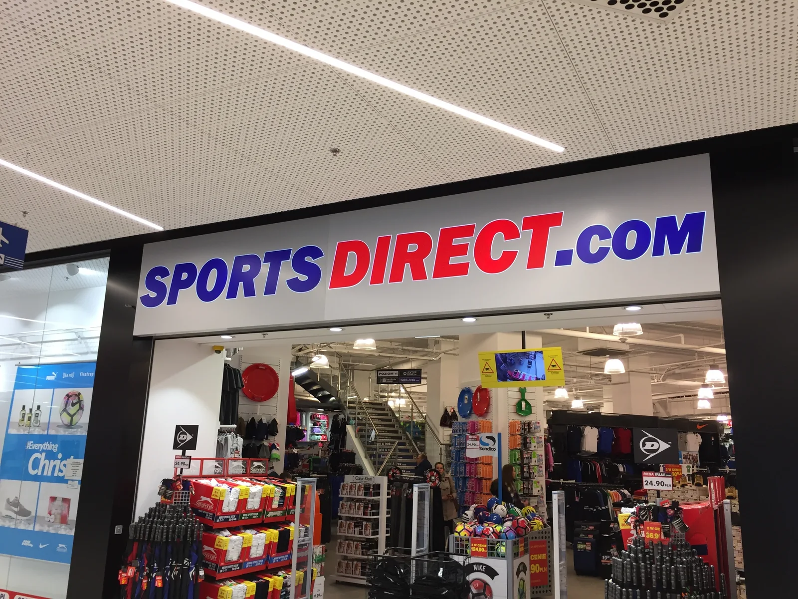 Sports Direct — Lightbox light with logotypem storeu sportsgo Sports Direct.com from LED backlight, mounted nad entrance for point
