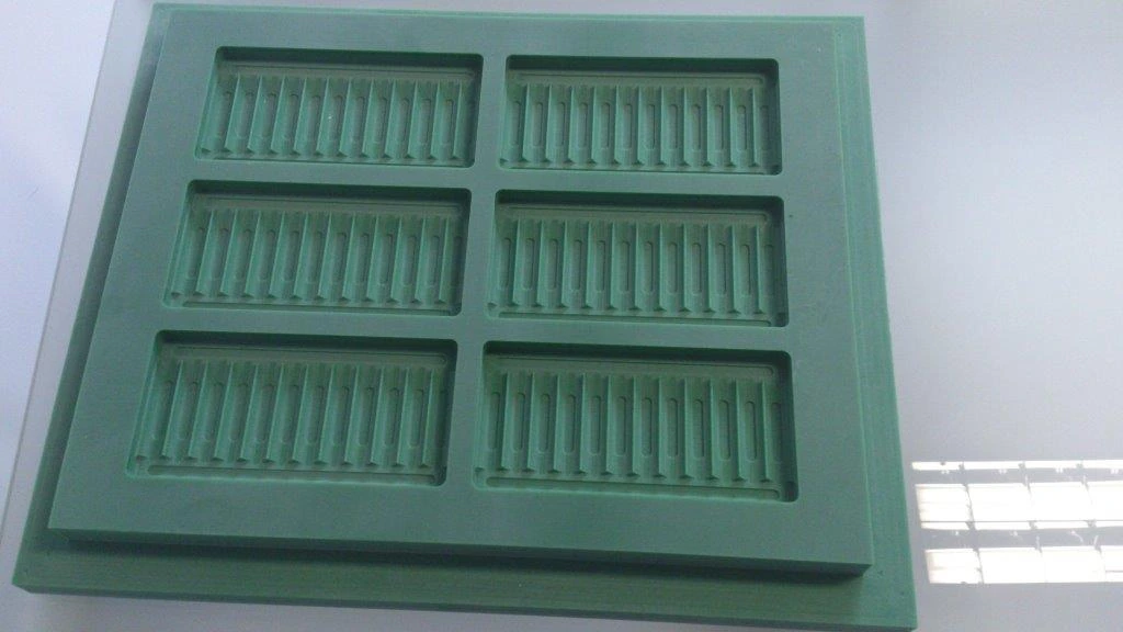 CNC service — green technical resin mould 3D-milled on CNC — 6 sectionssekcji from precise channels for elements cylindryczne (~2