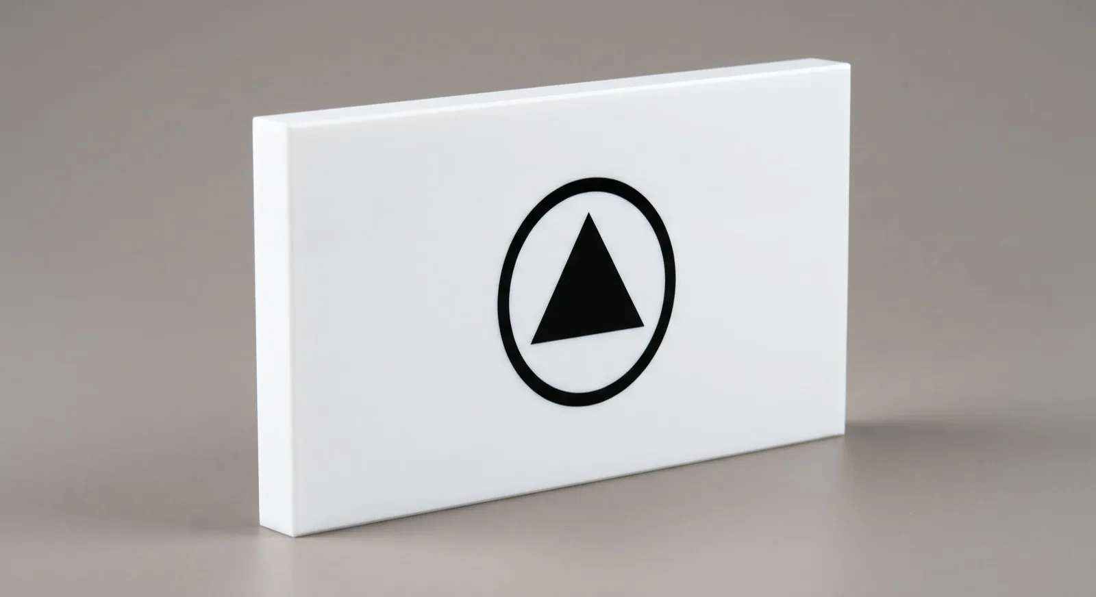 White acrylic block with a logo printed on the front face